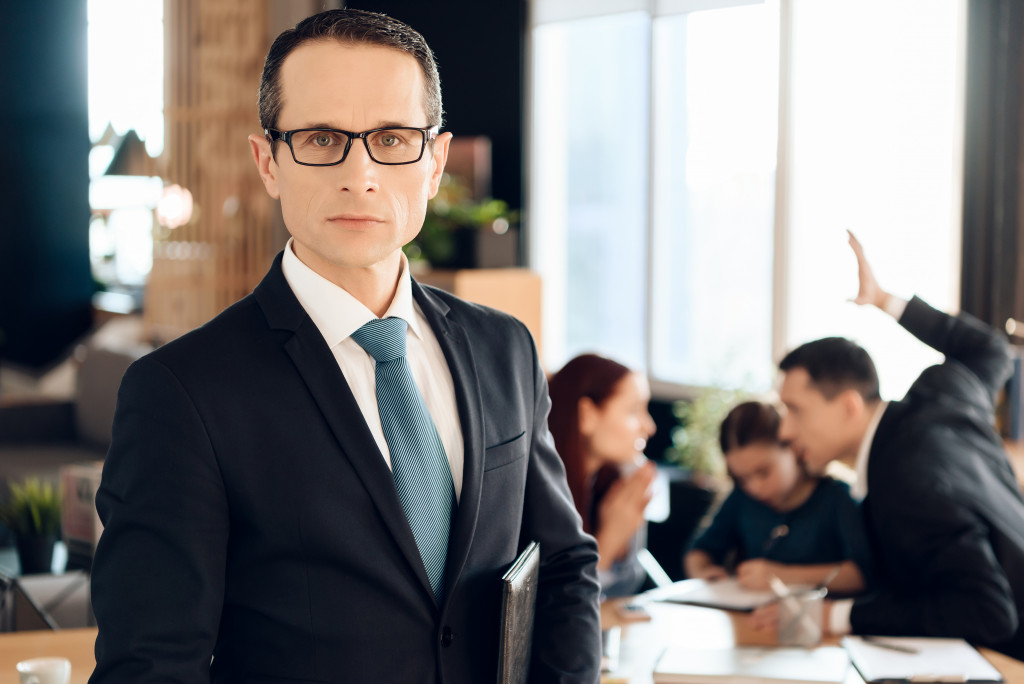 lawyer in front of family arguing 